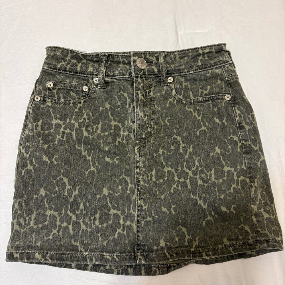 Green cheetah print mini skirt
